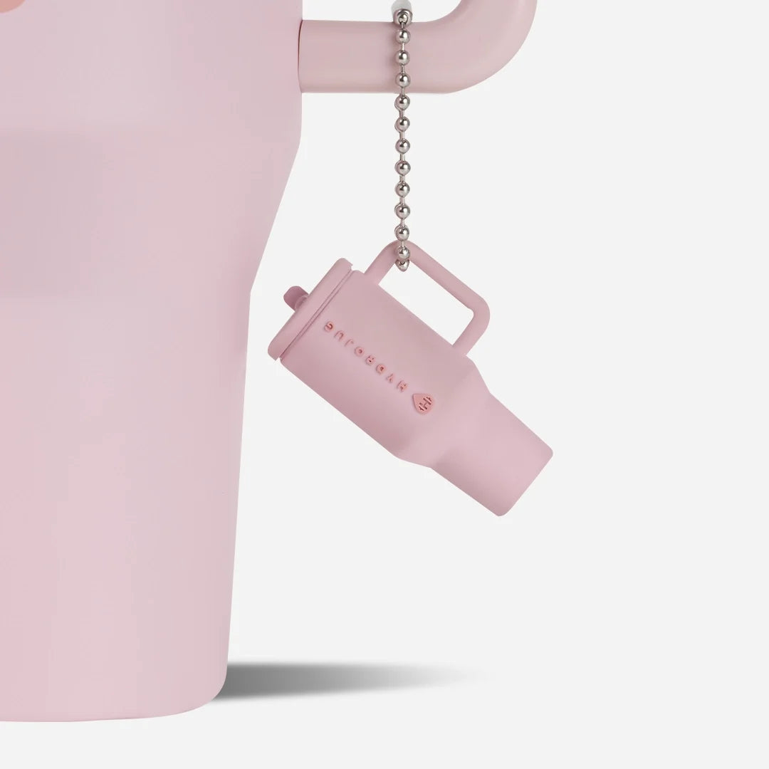 traveler-keychain-b0 Web-TravelerKeychainPhotos-PinkSand2.webp